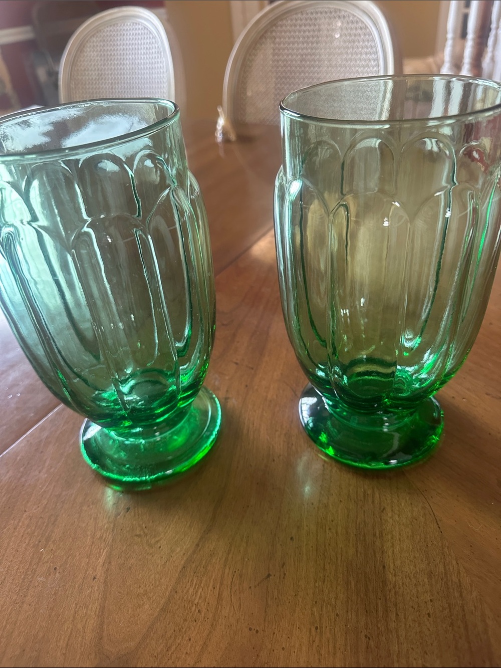 Set of Two Green Glass decorator goblets 9 inches tall and 4 inches wide at top